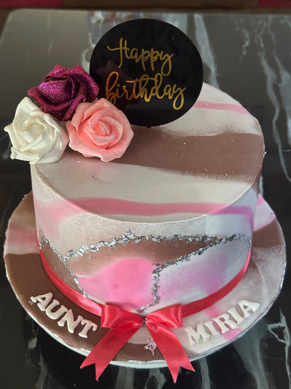 Custom decorated cake with pink and white roses